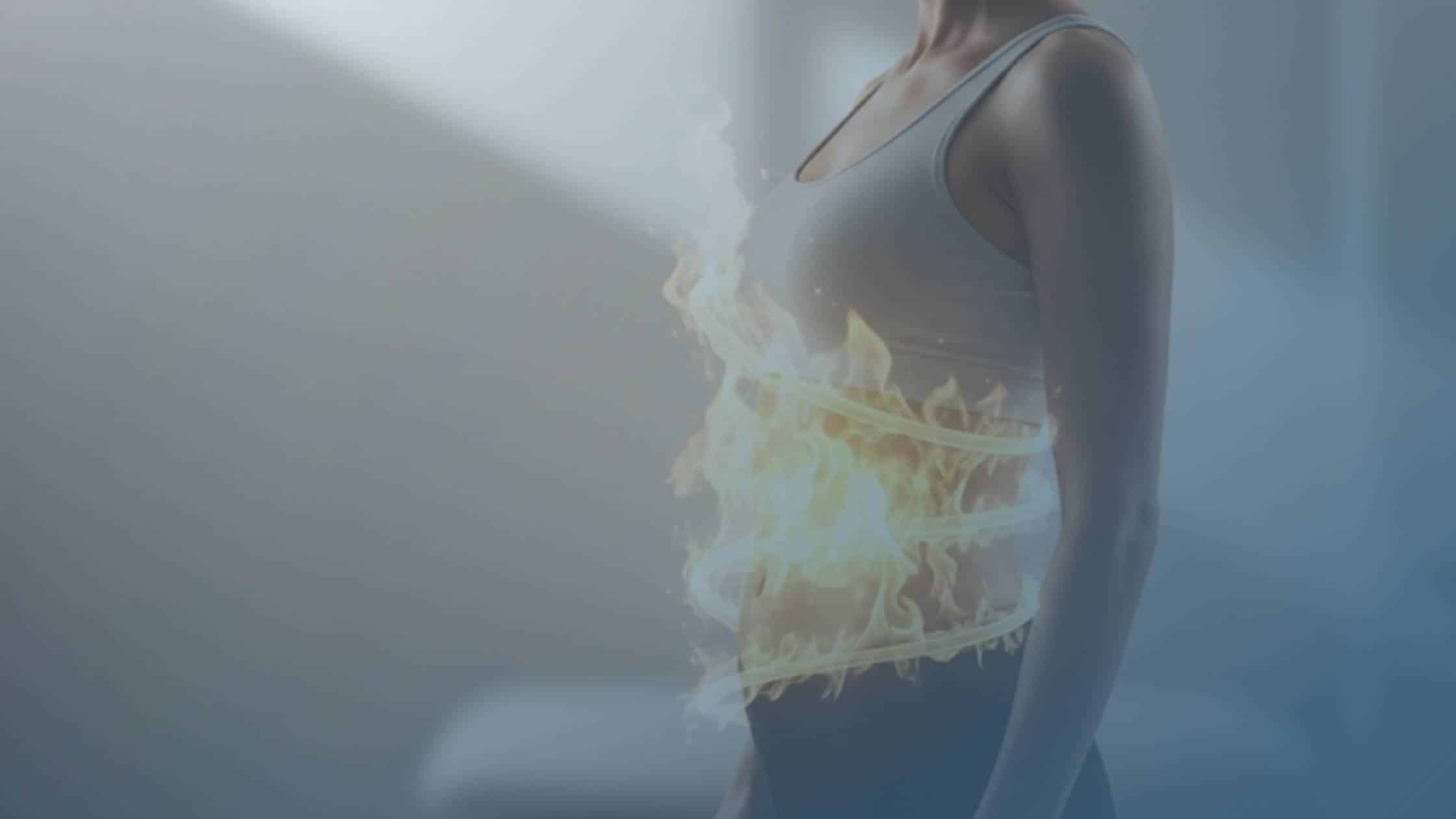 Representação conceitual do metabolismo acelerado, com efeito de fogo em volta do abdômen de uma mulher.
